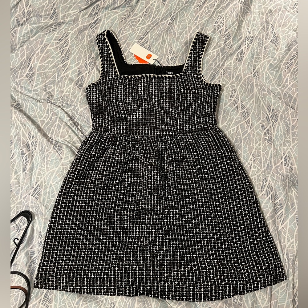 NWT black and white dress from Cider. Ordered the wrong size.